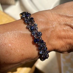 Givenchy bracelet, side clasp, dark & light purple and pink stones.